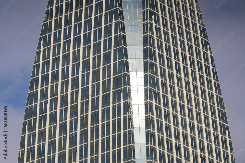 Modern skyscraper office buildings made of steel and glass. Corporation headquarters buildings industry. Modern skyscraper office buildings made of steel and glass. Corporation headquarters buildings industry.