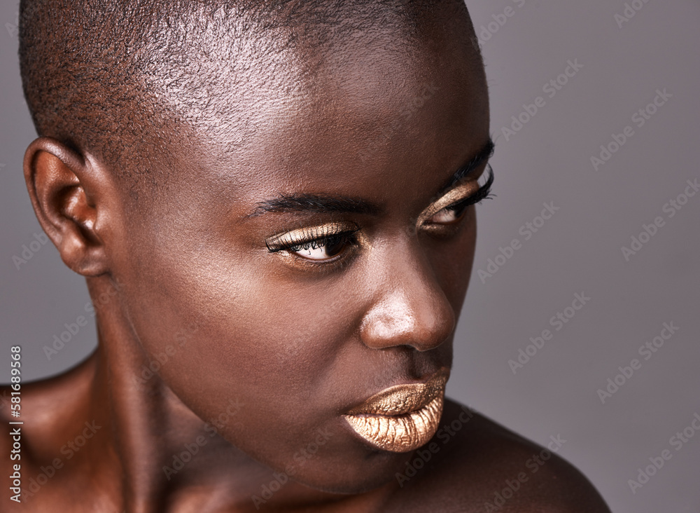 Obraz premium She believed that glamour meant feeling good in your own skin. Closeup shot of a beautiful woman in a studio.