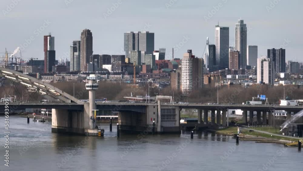 Aerial voiew showing skyline of Rotterdam and traffic on Van Brienenoord bridge durign sunny day Aerial voiew showing skyline of Rotterdam and traffic on Van Brienenoord bridge durign sunny day
