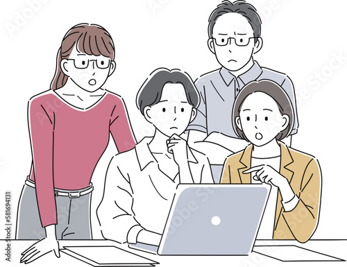 ノートパソコンを囲んで話し合うビジネスパーソン