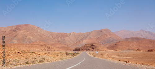 Asphalt road with mountain in the background, Morocco
