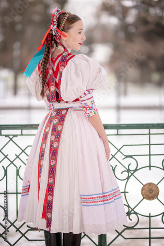 Beautiful woman wearing traditional Eastern Europe folk costumes. Slovak folk costumes.