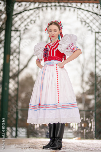 Beautiful woman wearing traditional Eastern Europe folk costumes. Slovak folk costumes.