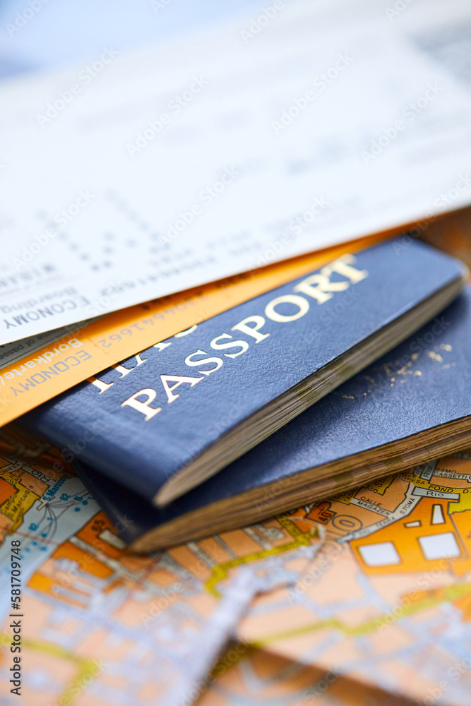 pins marking travel itinerary points on map and passport pins marking travel itinerary points on map and passport