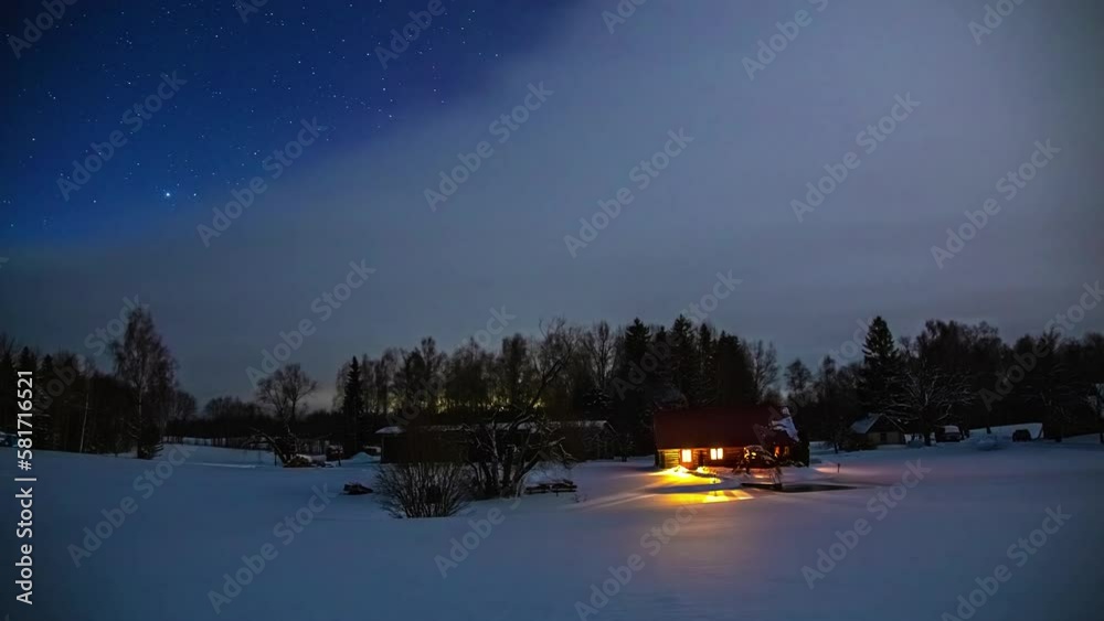 Winter landscape with houses where the light is switched on and off over a period of time. Time Lapse Winter landscape with houses where the light is switched on and off over a period of time. Time Lapse