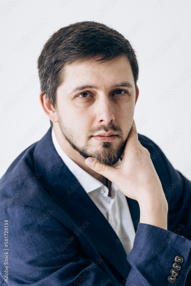 Portrait of a man in a business suit and white shirt Portrait of a man in a business suit and white shirt