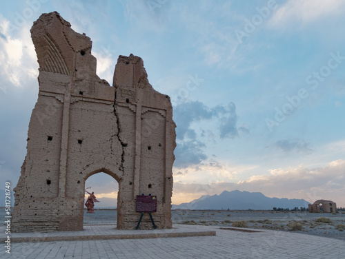 Low-angle view of the ancient Gate of Farafar, Mehriz city in Yazd Province, Iran photo