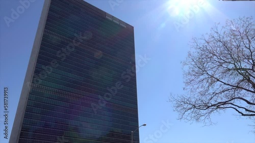 UN BUILDING exterior day  with tree and sun