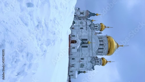 Belogorsky St. Nicholas Orthodox Missionary Monastery. Russia, Perm Krai, Belaya Gora. The temple on the hill in winter. Monastery on the background of snow. 4K photo