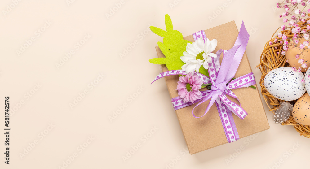 Gift box, Easter eggs and flowers