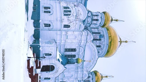 Belogorsky St. Nicholas Orthodox Missionary Monastery. Russia, Perm Krai, Belaya Gora. The temple on the hill in winter. Monastery on the background of snow. 4K photo