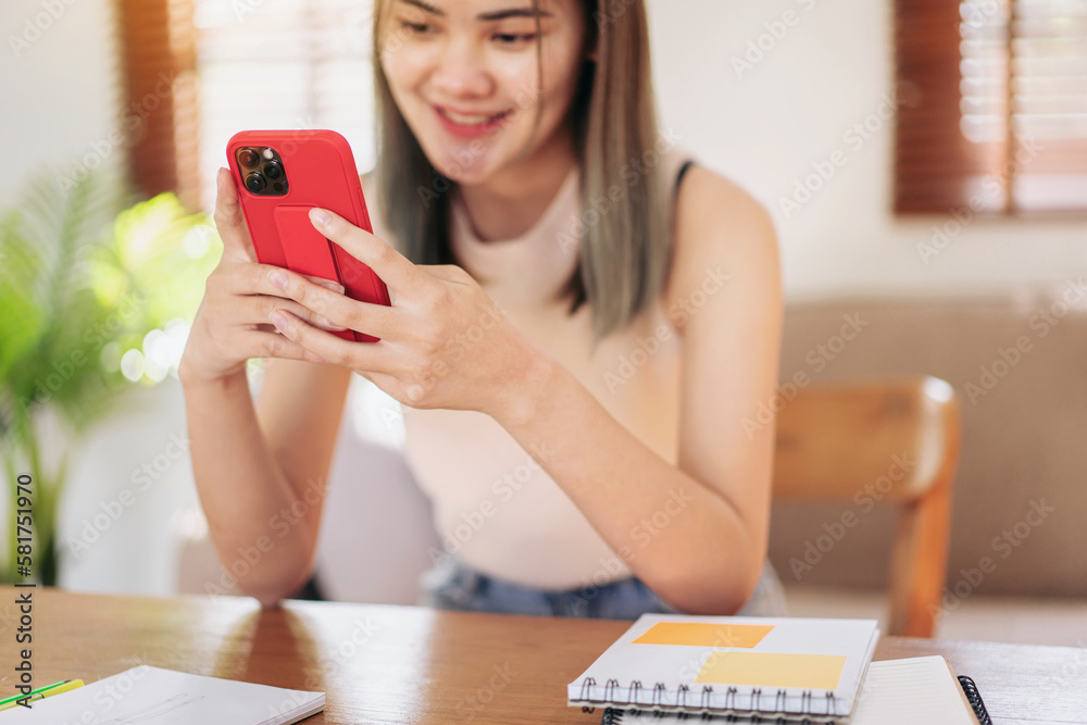 Female fashion artist checking photo of new fashion collection i Female fashion artist checking photo of new fashion collection i