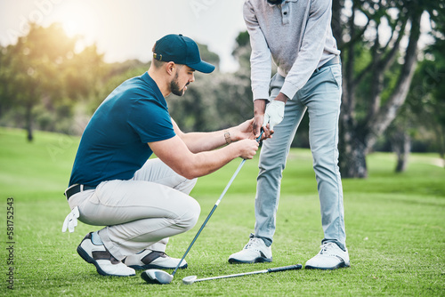 Fototapeta Naklejka Na Ścianę i Meble -  Golf lesson, teaching and sports coach help man with swing, putt and stroke outdoor. Lens flare, green course and club support of a athlete ready for exercise, fitness and training for a game