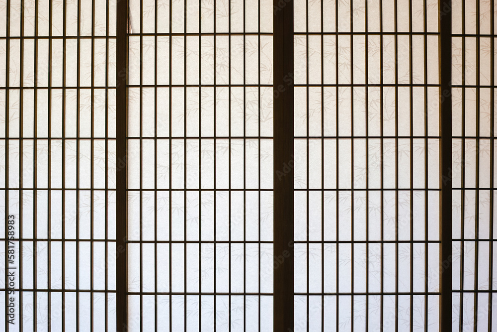 Frontal view of a traditional Japanese style shÅji as a blank background for Japanese themes. The paper walls in wooden frames let daylight into the interior. Frontal view of a traditional Japanese style shÅji as a blank background for Japanese themes. The paper walls in wooden frames let daylight into the interior.
