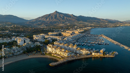 vista aérea de puerto Banús en un bonito atardecer en la ciudad de Marbella, España	 photo