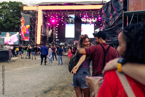 Two couples arriving at music festival