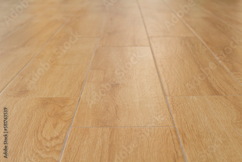 Floor tiles imitation wood grain inside the house for the background.