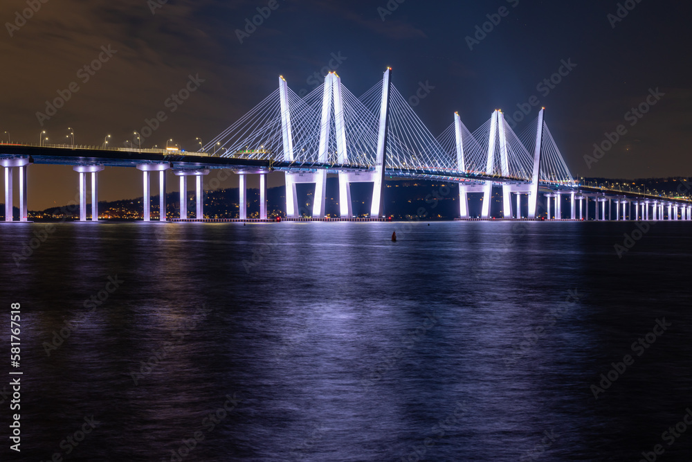 Night photo of the Governor Mario M. Cuomo Bridge, spanning the Hudson River between Tarrytown and Nyack - obrazy, fototapety, plakaty 