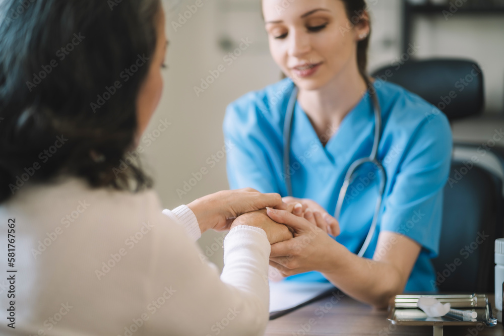 Female doctors shake hands with patients encouraging each other To offer love, concern, and encouragement while checking the patient's health. concept of medicine. Female doctors shake hands with patients encouraging each other To offer love, concern, and encouragement while checking the patient's health. concept of medicine.
