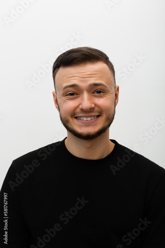 young man expressing smiling emotions, smile