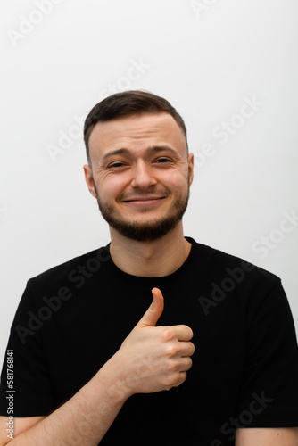 young man expressing smiling emotions, smile, thumb 