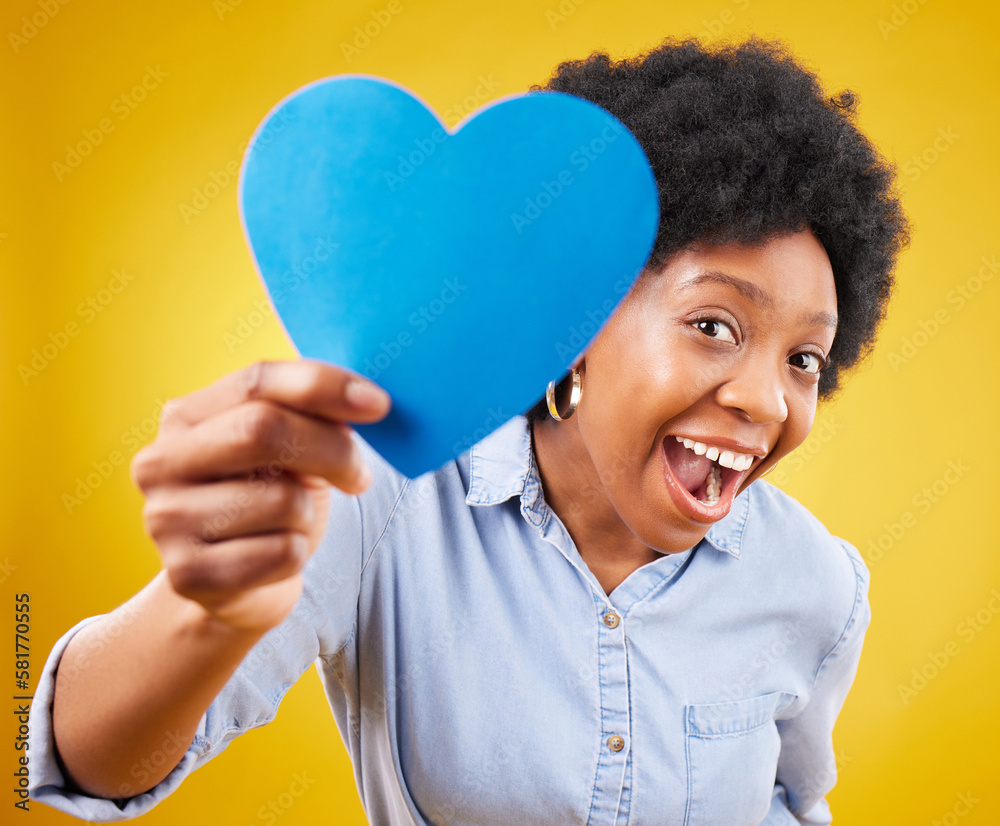 Paper, heart and excited with black woman in studio for romance, positive and emotion. Happiness, love shape and giving with female isolated on yellow background for date, feelings and affectionate Paper, heart and excited with black woman in studio for romance, positive and emotion. Happiness, love shape and giving with female isolated on yellow background for date, feelings and affectionate