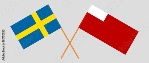 Crossed flags of Sweden and Abu Dhabi. Official colors. Correct proportion