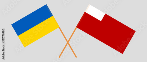 Crossed flags of Ukraine and Abu Dhabi. Official colors. Correct proportion