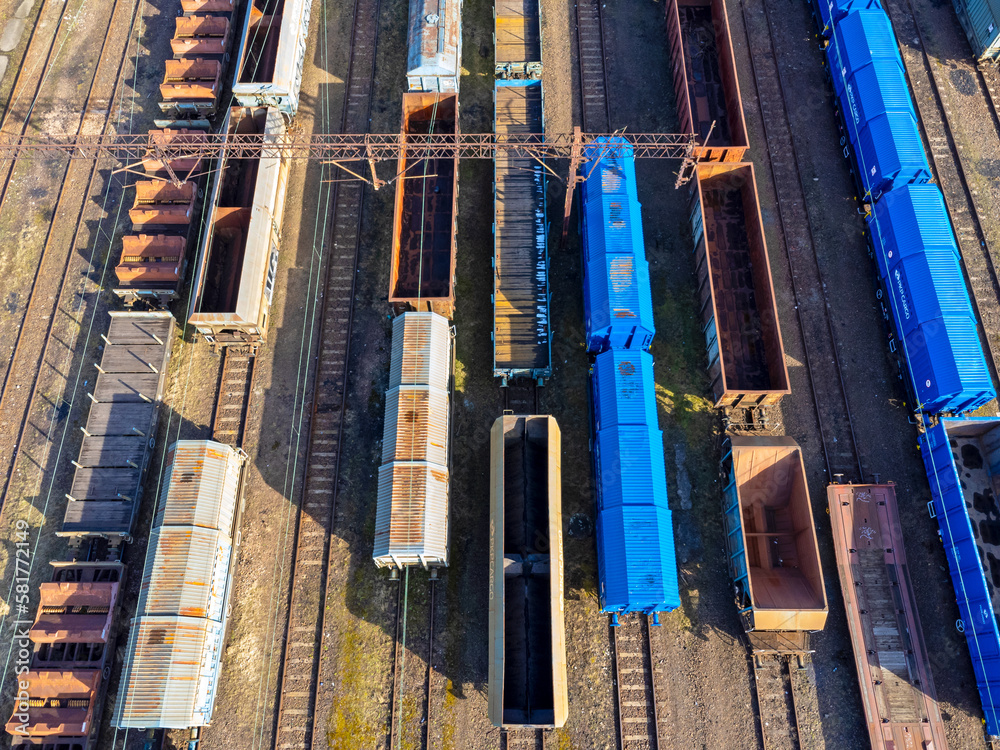 Aerial view landscape. Tracks and trains. Coal wagon. Transportation.