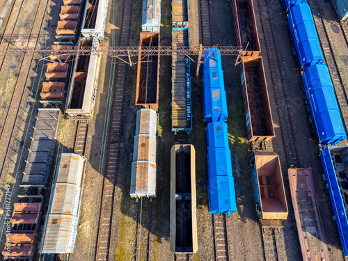 Obraz na płótnie Aerial view landscape. Tracks and trains. Coal wagon. Transportation. w salonie