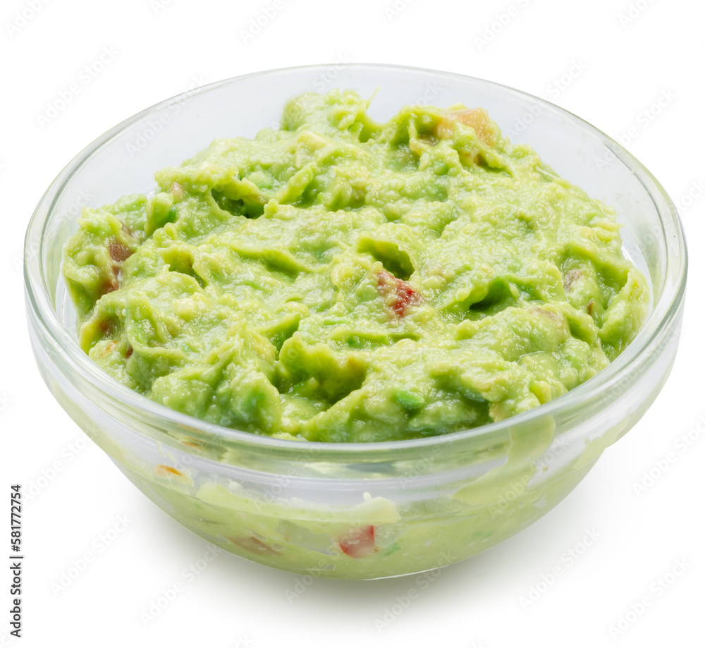 Glass bowl of guacamole on white background. File contains clipping path. Glass bowl of guacamole on white background. File contains clipping path.
