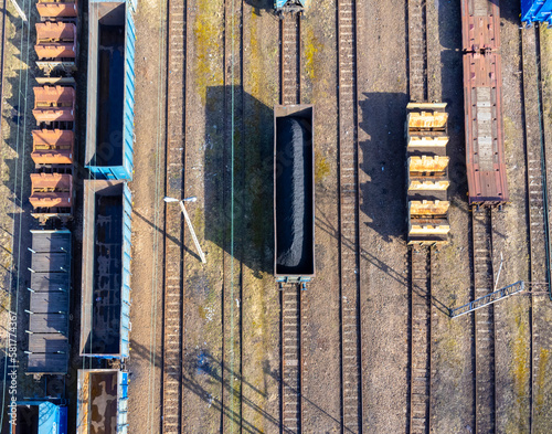 Obraz na płótnie Aerial view landscape. Tracks and trains. Coal wagon. Transportation. w salonie