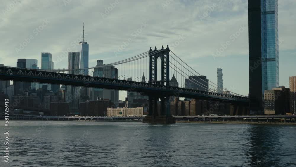 Brooklyn bridge and lower Manhattan tracking shot on sunset, New York Brooklyn bridge and lower Manhattan tracking shot on sunset, New York