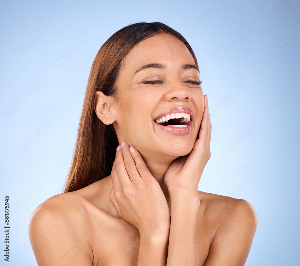 Skincare, makeup and woman laughing with hands on face in studio for skin care promo on blue background. Beauty, facial and cosmetics, hispanic model with smile in Brazil for happy dermatology promo.