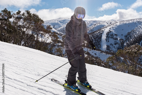 person skiing on a beautiful winters day photo