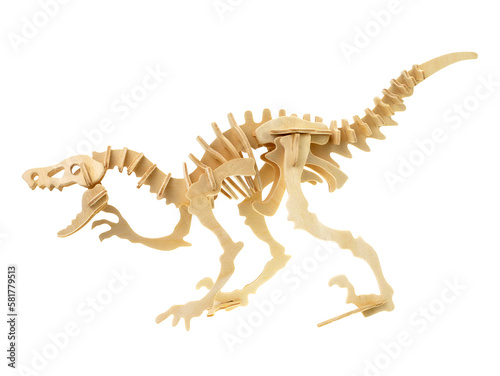 Wooden toy dinosaur skeleton isolated on white background  Wooden dinosaur crafts.
