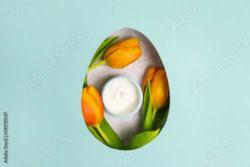Canvas Print ?osmetics cream with yellow tulips in an easter egg