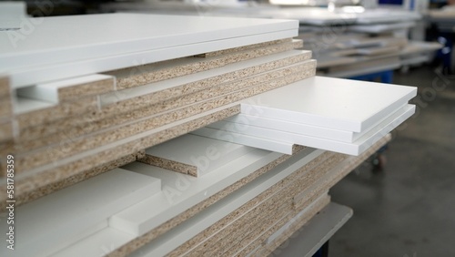 Samples of chipboard and MDF panels for furniture production. Samples of finishing material based on chipboard and MDF, close-up.