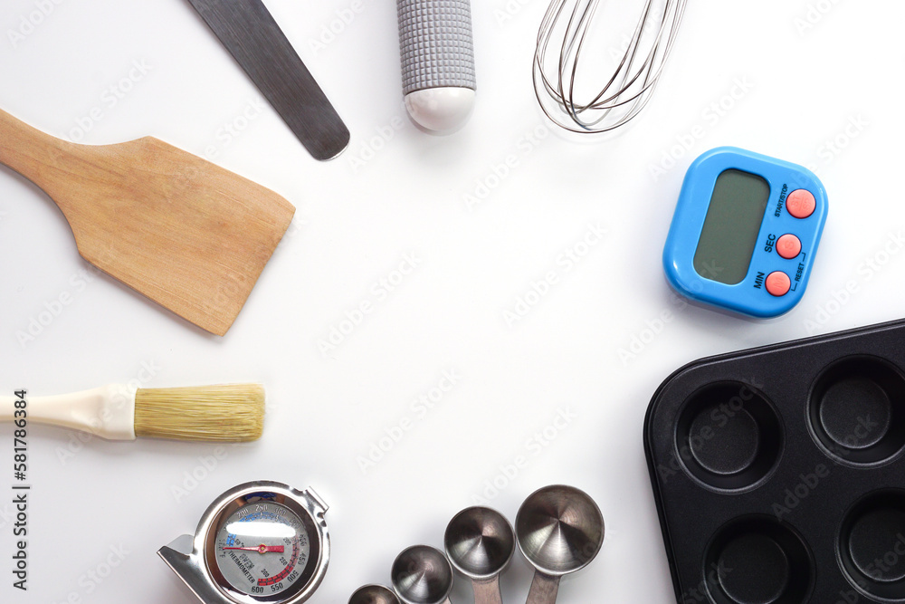 Top view set of kitchen utensils and ingredients for bakery on white background. Materials or kitchen equipment for bakery. Top view set of kitchen utensils and ingredients for bakery on white background. Materials or kitchen equipment for bakery.