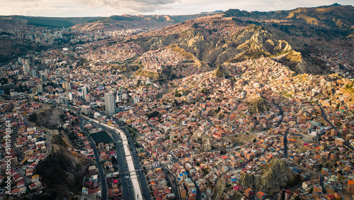 Metropolitan City of La Paz, Bolivia, Aerial Drone Above Urban Capital, Streets, Avenues, Architecture and Andean Cordillera Background