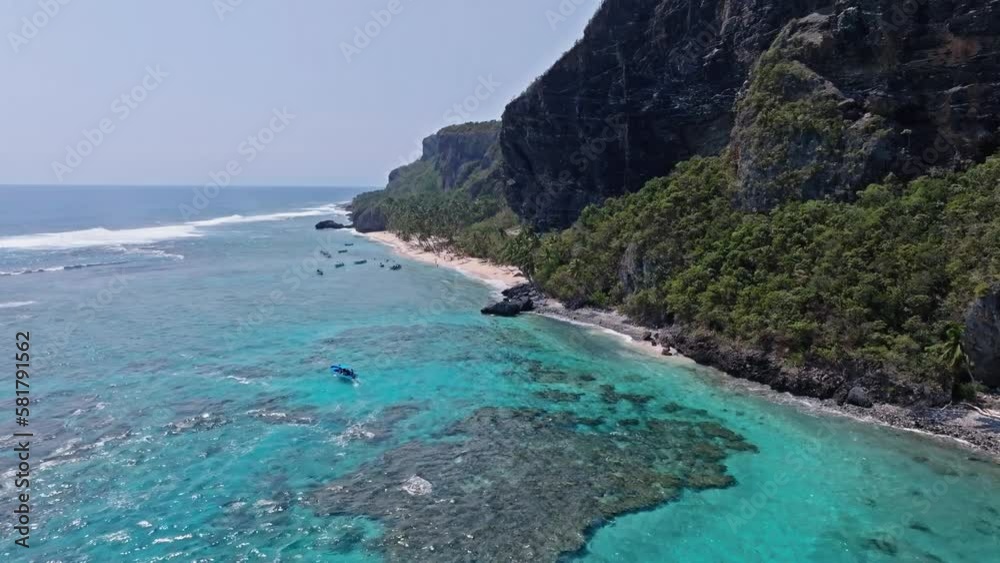 Aerial drone flight towards hidden tourist beach in the jungle, dominican republic Aerial drone flight towards hidden tourist beach in the jungle, dominican republic