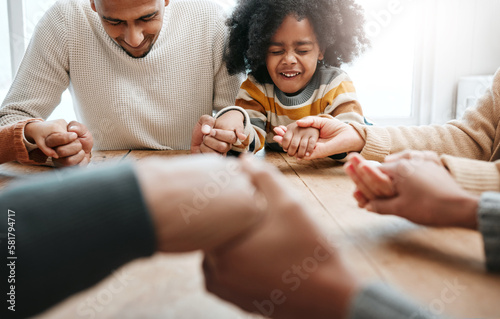 Praying, together and family holding hands for worship, support and church service. Happy, hope and a father, child and people with prayer, faith and belief in religion, grateful and praising