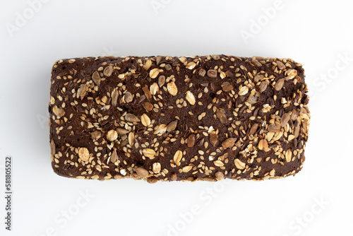 whole rye bread isolated on white background, top view