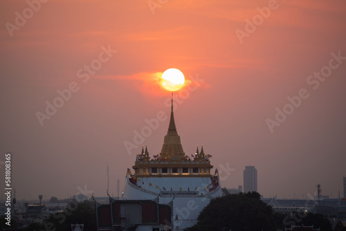 Beautiful sunset at golden mount temple