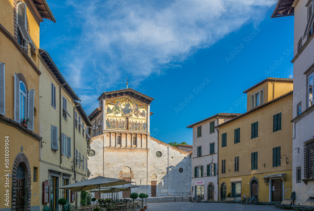 The Basilica of San Frediano , a Romanesque church in Lucca, Italy, situated on the San Frediano square - Lucca , Tuscany, Italy - may 30, 2021