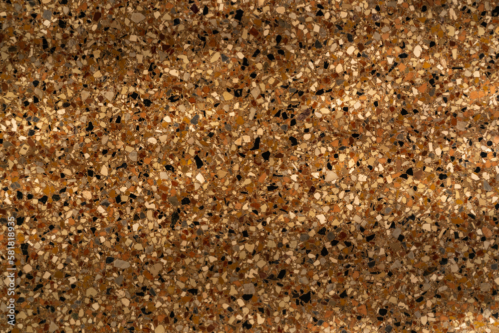 Brown background of small pebbles, natural stone, stylish coating. Interior design, materials for repair Brown background of small pebbles, natural stone, stylish coating. Interior design, materials for repair