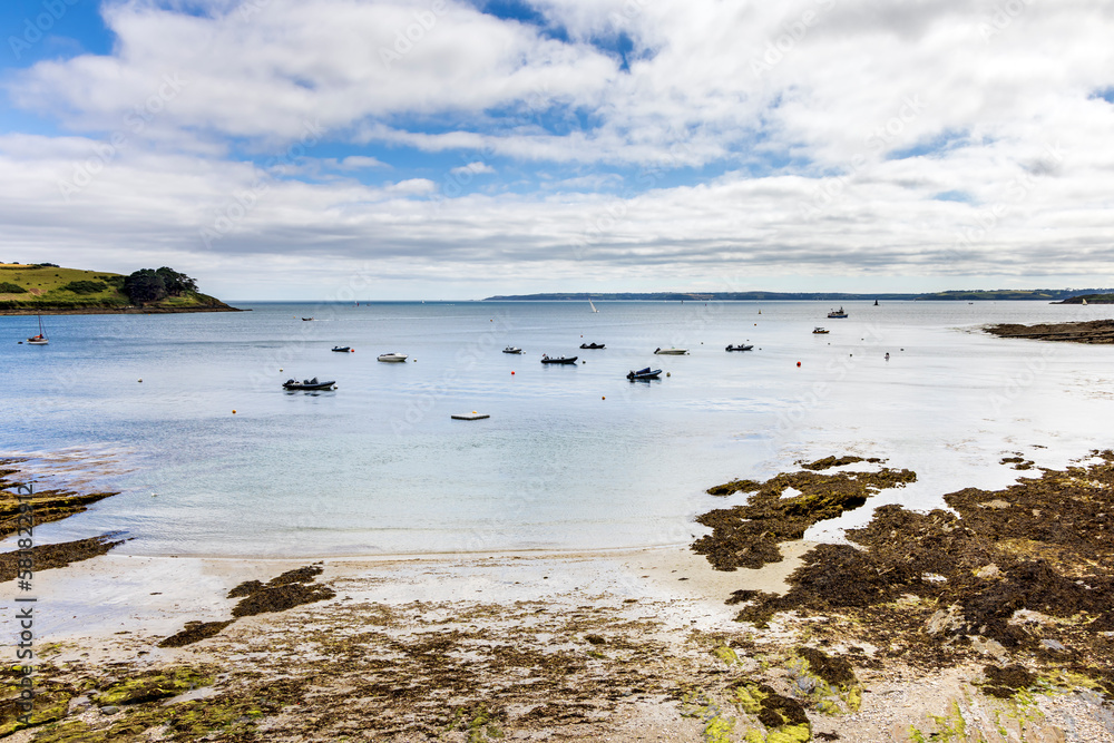 View from Tavern Beach in the picturesque seaside village of St Mawes on the Roseland Peninsula in Cornwall. View from Tavern Beach in the picturesque seaside village of St Mawes on the Roseland Peninsula in Cornwall.