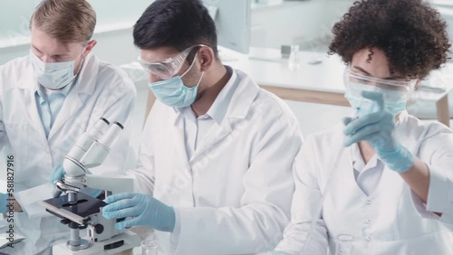 image a group of scientists working in a laboratory.