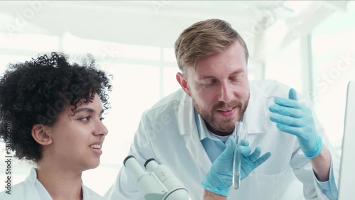 image a group of scientists working in a laboratory.