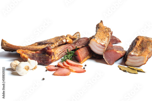 Dried pork meat smoked on traditional way with garlic , rosemary and pepper isolated on white background.